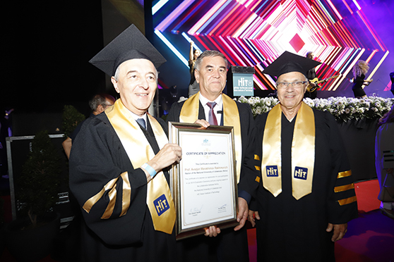 Prof. Avaz Marakhimov receiving a special certificate of appreciation